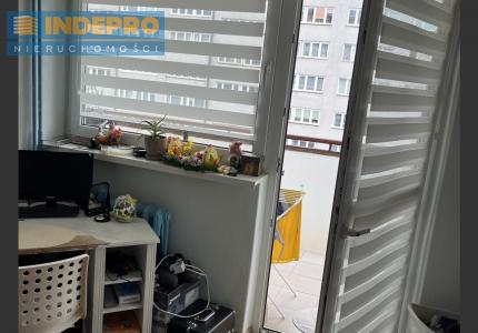 Pokój z wyjściem na balkon