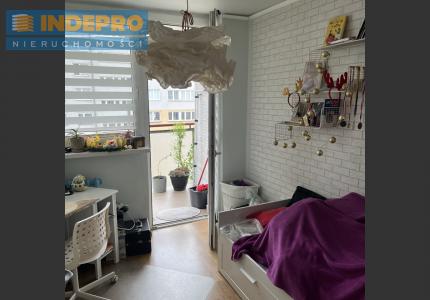Pokój z wyjściem na balkon